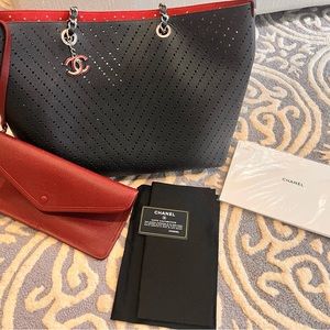 Chanel perforated grained calfskin black tote with burgundy interior